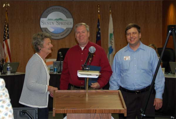 Mack, W4AX and Ian, AK4IK Receive proclamation from Mayor Eva Galambos